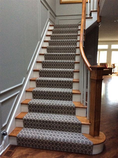Painted and stained stairs with a runner. Stair runner ideas. Carpet