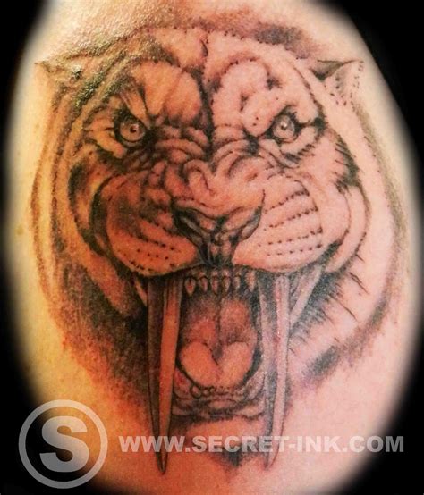 Sabre Tooth Tiger Tattoo