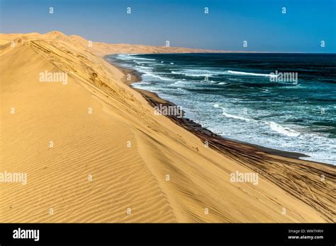 Sand Dunes Meet Ocean Namibia