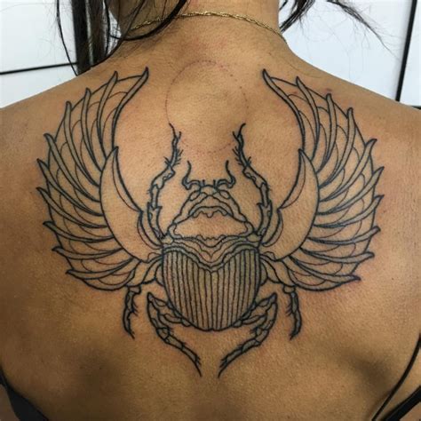 Neotraditional scarab chest piece by Lindsay Wilson at
