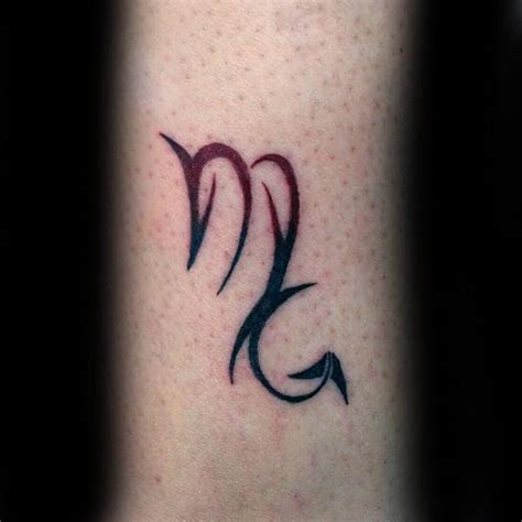 My scorpio symbol tattoo by the amazing Thomas Marban