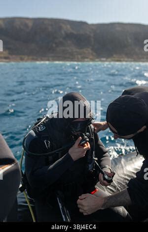 Scuba Diver Helping