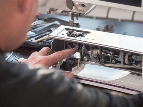 Sewing Machine Repair Indianapolis - Professional Technician Examining Sewing Machine