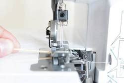 Sewing Machine with thread tangled and needle stuck