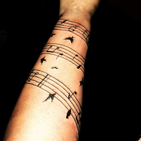 Amazing Tattoos Inspired by Music Sheet Music