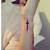 Side Wrist Cross Tattoo