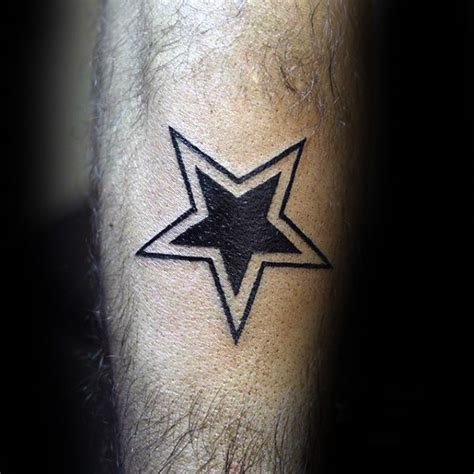 Simple star tattoo, but two large stars. One blue the