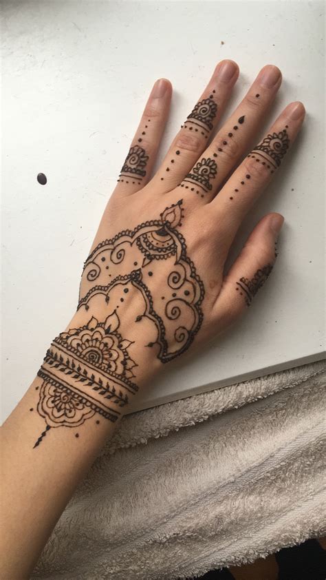 Simple Small Henna Hand Tattoo