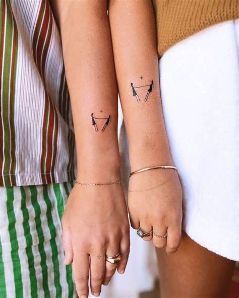 Simple Small Matching Tattoos For Sisters