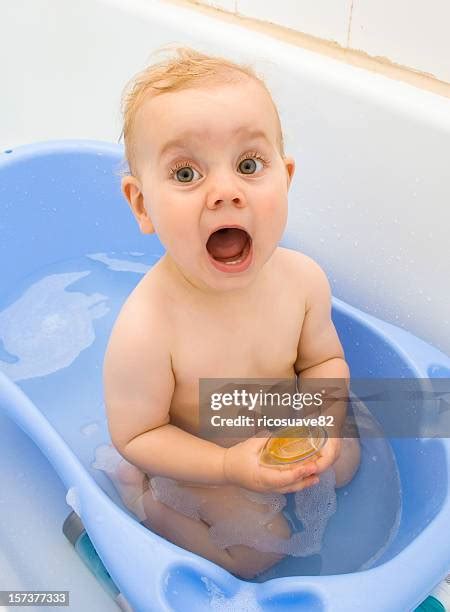 Singing while showering baby