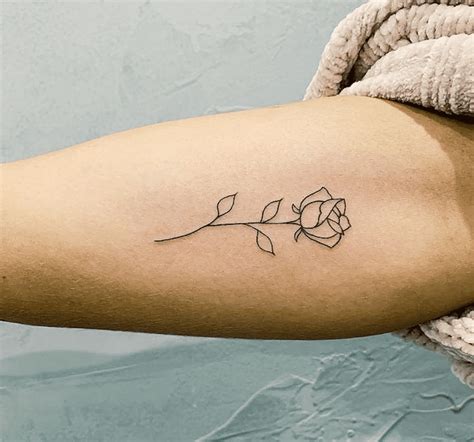 Single needle rose tattoo by Greg from Deers Eye