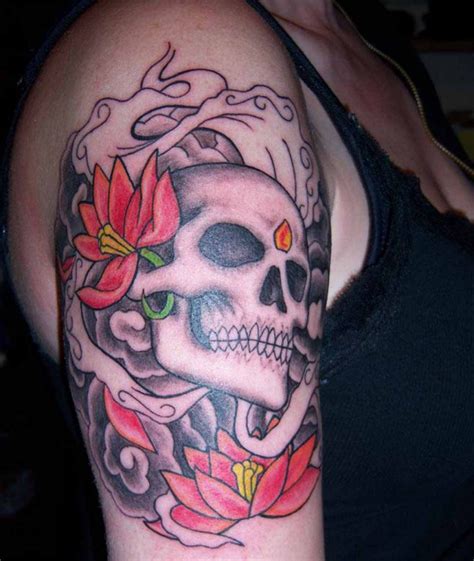 Awesome Skull With Sunflower Thigh Tattoo Design For