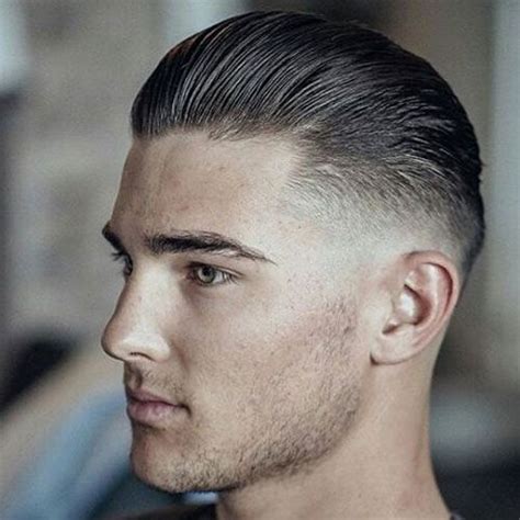 Unleash Your Bold Confidence with the Mesmerizing Slick Back Skin Fade Hairstyle