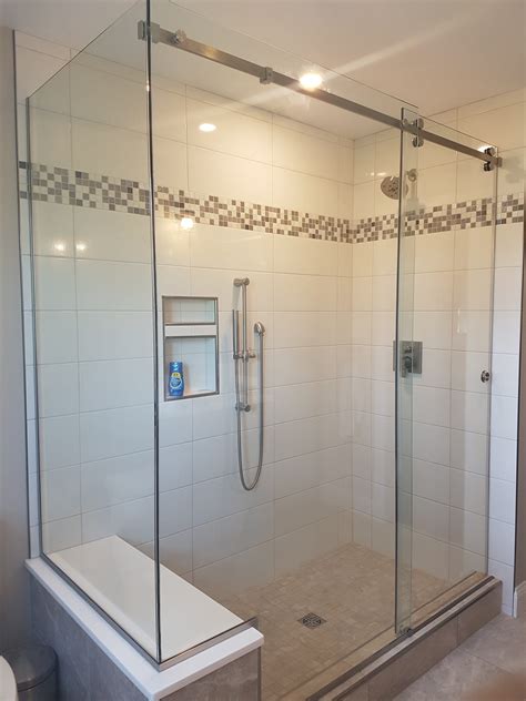 DreamLine EnigmaX 56 to 60 in. x 76 in. Frameless Sliding Shower Door in Brushed Stainless