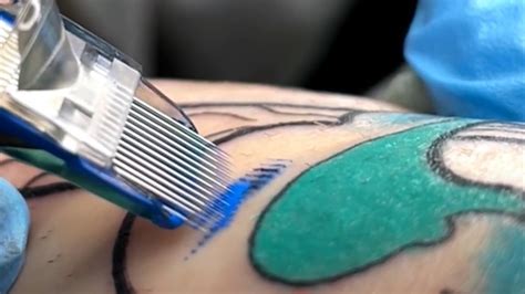 Tattoo up close slow motion YouTube