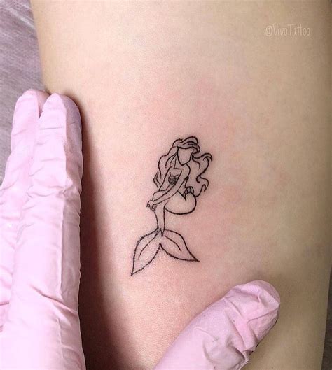 Little mermaid tattoo Waist tattoos, Mermaid tattoos