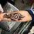 Small Tribal Tattoo Designs For Men