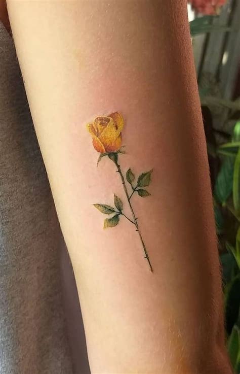 Yellow rose on back of ankle w mama Tattoosonback