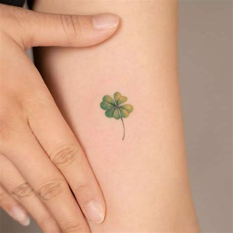 White Four leaf clover tattoo Clover tattoos, Shamrock