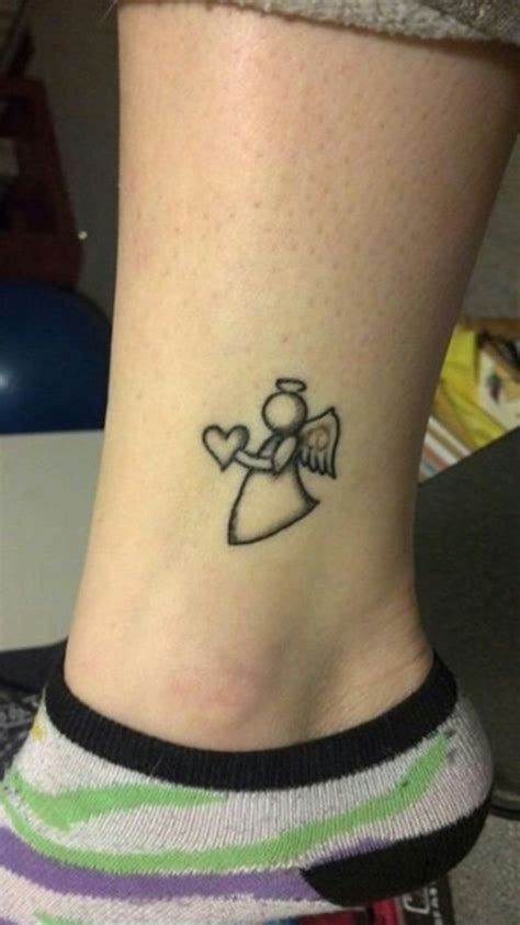 My Angel Heart tattoo in memory of all my angels.. Ankle