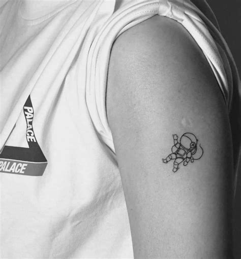Small Astronaut Tattoo Design