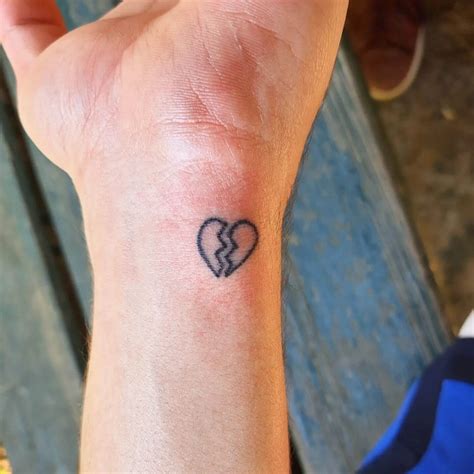 The Symbolic Splendor of Small Broken Heart Tattoos: A Reflection of Love and Resilience