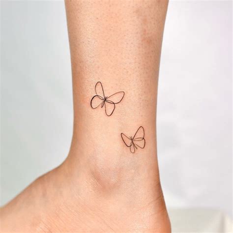 Flutter Your Style with These 40 Mesmerizing Small Butterfly Tattoos: The Ultimate Guide to Get Inked!