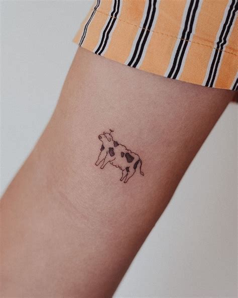 Small Cow Tattoo