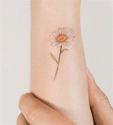 Small Daisy Flower Tattoo