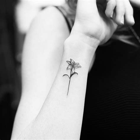 Small Lily Wrist Tattoo