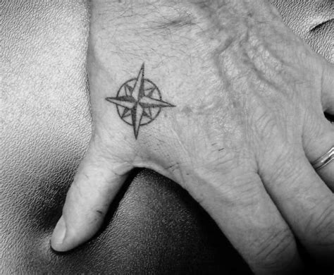 Tiny Treasures: Discover the Allure of Dashing Small Men's Hand Tattoos