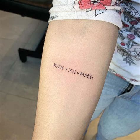 Small Roman Numeral Tattoo