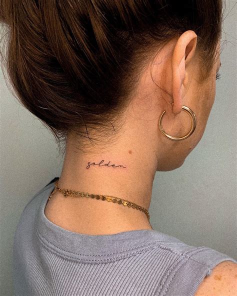 Small Script Neck Tattoo