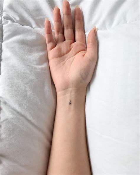 Small Tattoo On Wrist