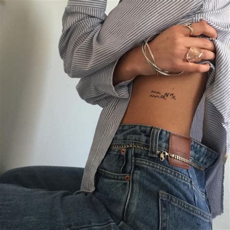 Small Tattoos On The Ribs