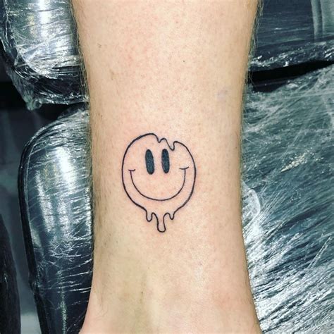 Winking Smiley Face Tattoo Get an InkGet an Ink Smiley