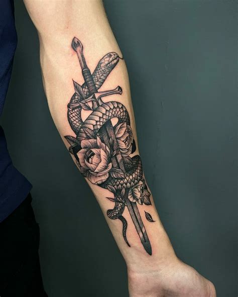 Snake And Sword Tattoo