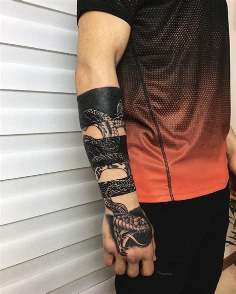 Top 41 Best Snake Arm Tattoo Ideas [2021 Inspiration Guide]