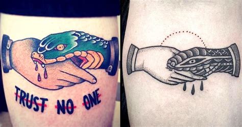 Snake Biting Hand Tattoo