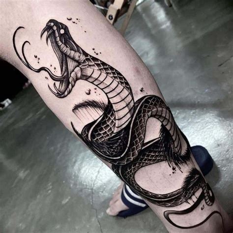 Stylish Snake Calf Tattoo: Bold Statement Piece for Fashionistas