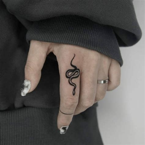 Snake Finger Tattoo