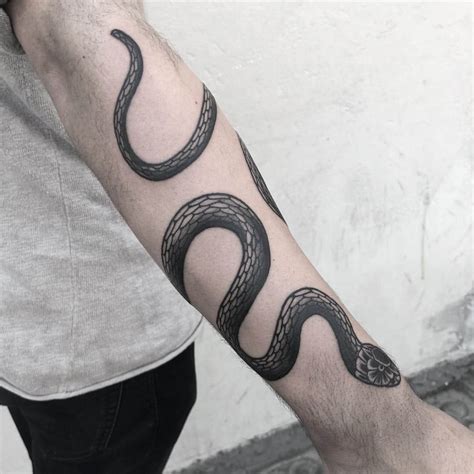 Snake Tattoo On The Arm