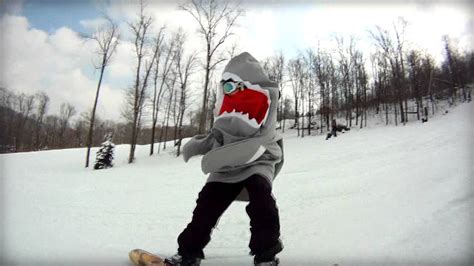 Snowboarding: because snow sharks need a playground too!