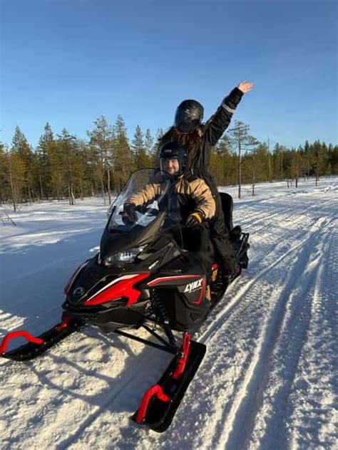 Snowmobiling through Arctic wilderness