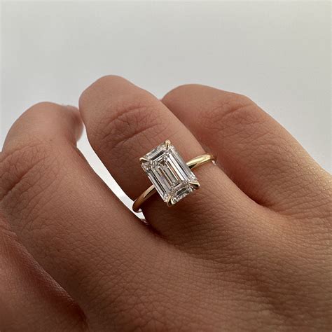 Solitaire Emerald Cut Ring