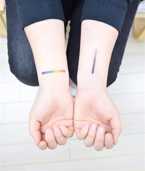 Moon spectrum tattoo on the left inner wrist. Minimalist