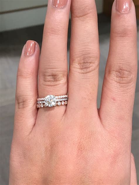 Radiant Romance: Elevate Your Wedding Day Style with Stacked Wedding Bands and a Stunning Solitaire