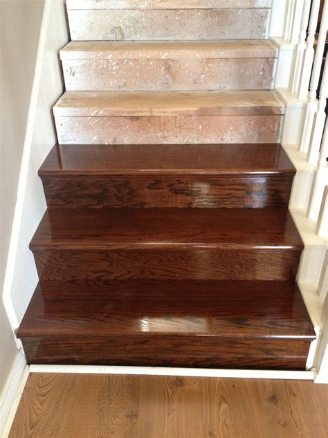 Refinished handrail and stair treads courtesy of my hubby and new