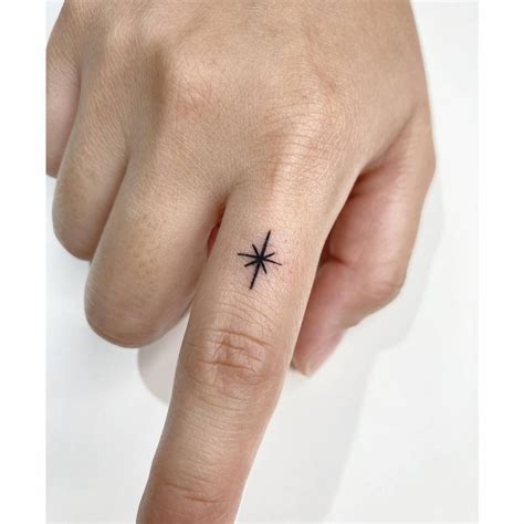 Star Finger Tattoo
