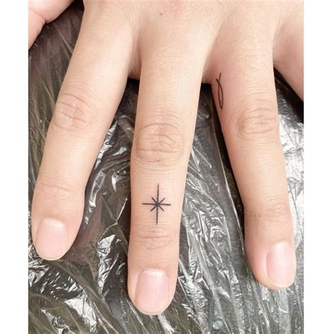 Star Finger Tattoos